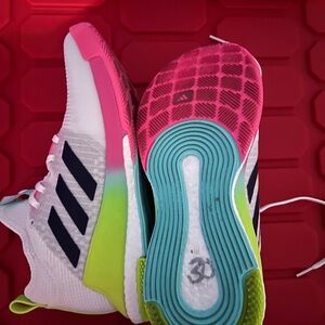 White and Pink Athletic Shoes